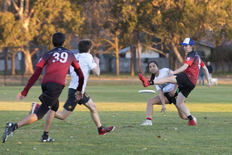 Ultimate frisbee players in training ahead of their return to competition. 