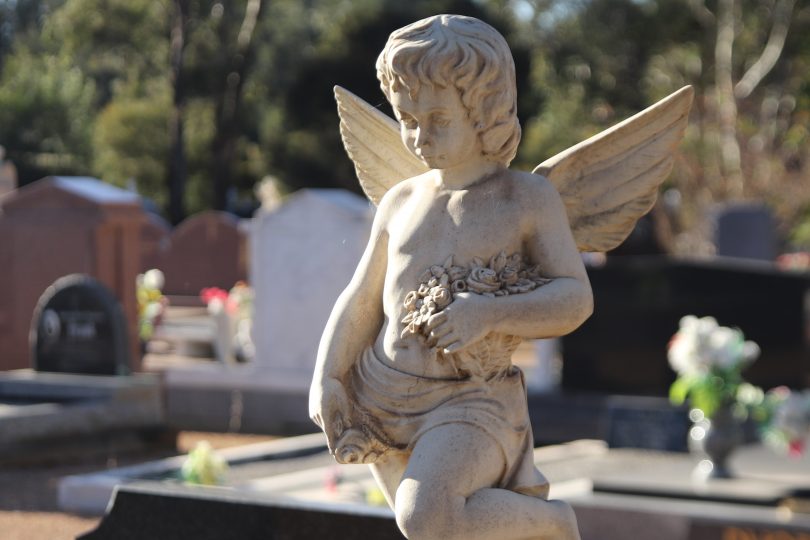 Angel statue on a grave at Gungahlin Cemetery
