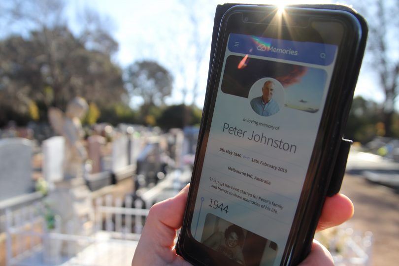 A digital memorial on mobile phone at Gungahlin Cemetery