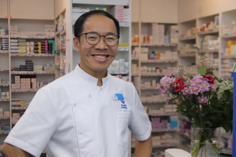 Tam Le standing in Palmerston Capital Chemist