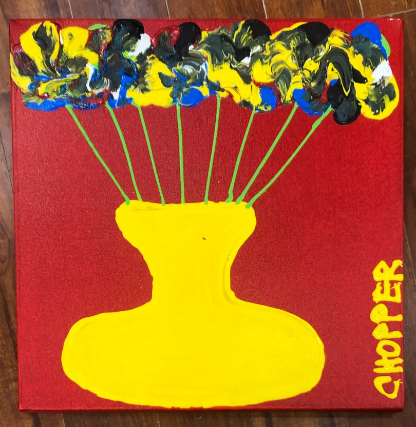 Painting of yellow vase of flowers with red background.