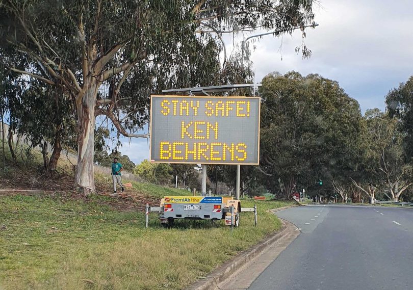 Roadside sign saying 'Stay Safe! Ken Behrens'