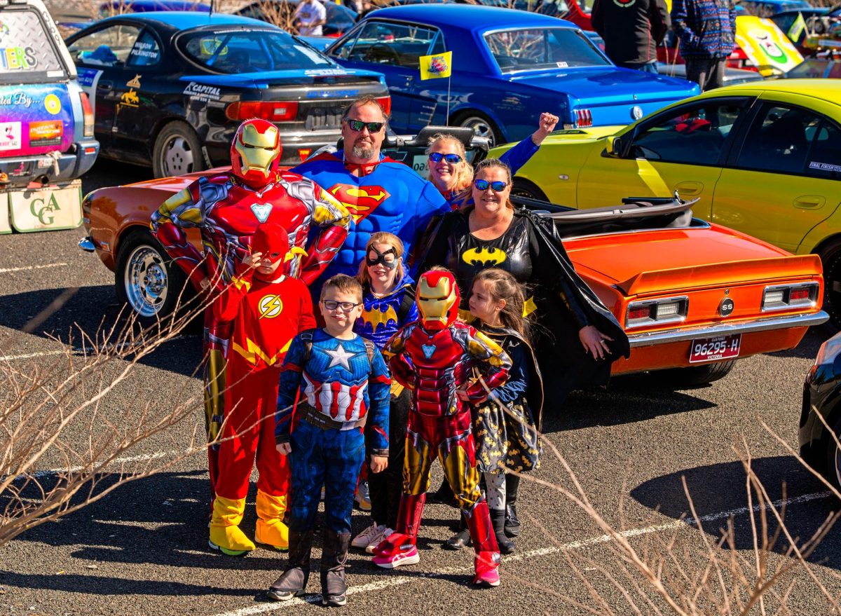 group in superhero costumes