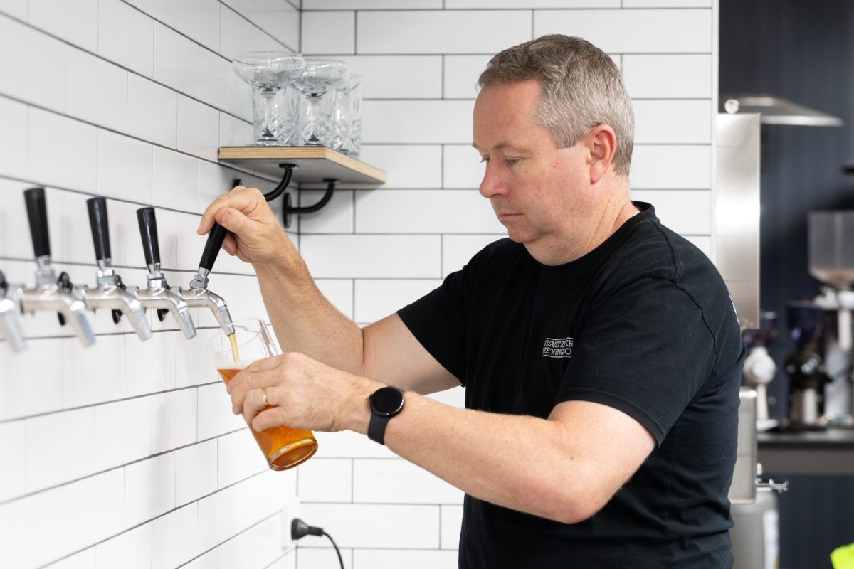 Man pouring beer