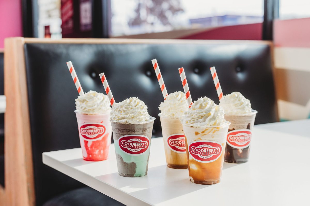 Five colourful sundaes on a table