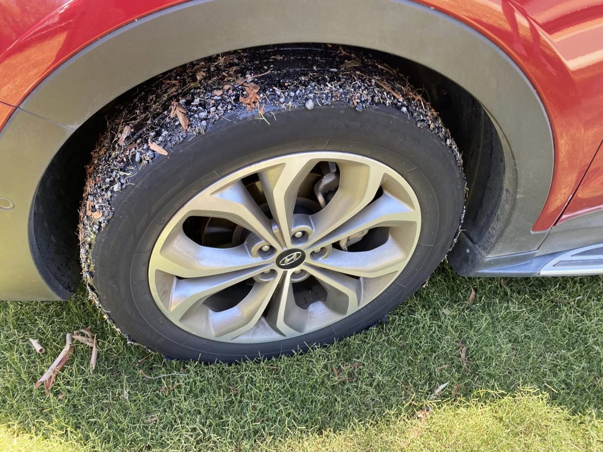 bitumen stuck on a car tyre