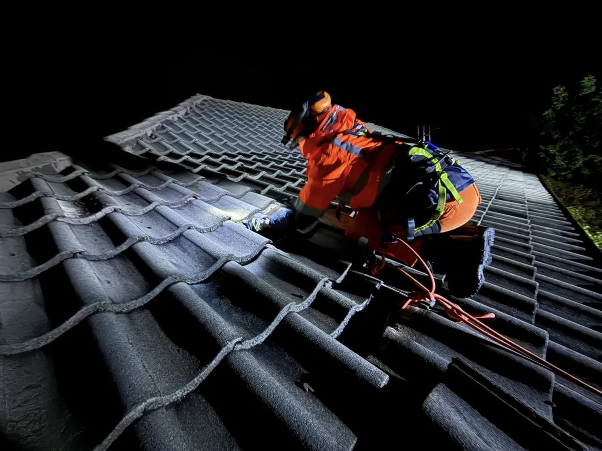 a man repairing a roof