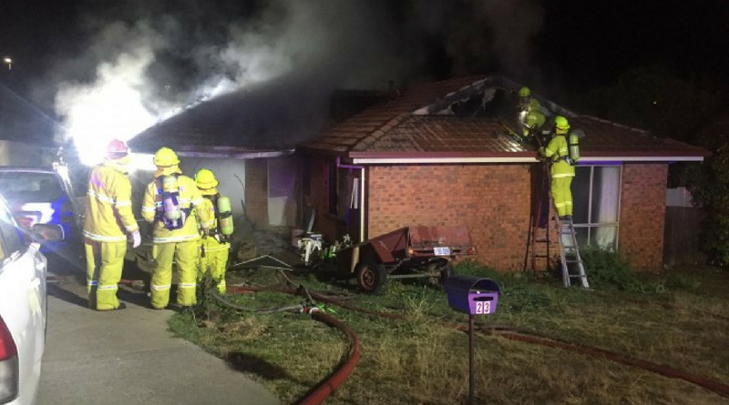 Nicholls woman rescued from house fire