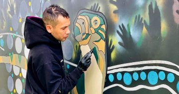 Meet the Kamilaroi artist painting the capital with his culture